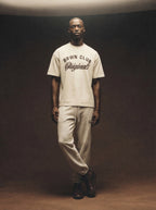 Originals Fleeced Jogger Sweatpants — worn with tee, moody editorial
