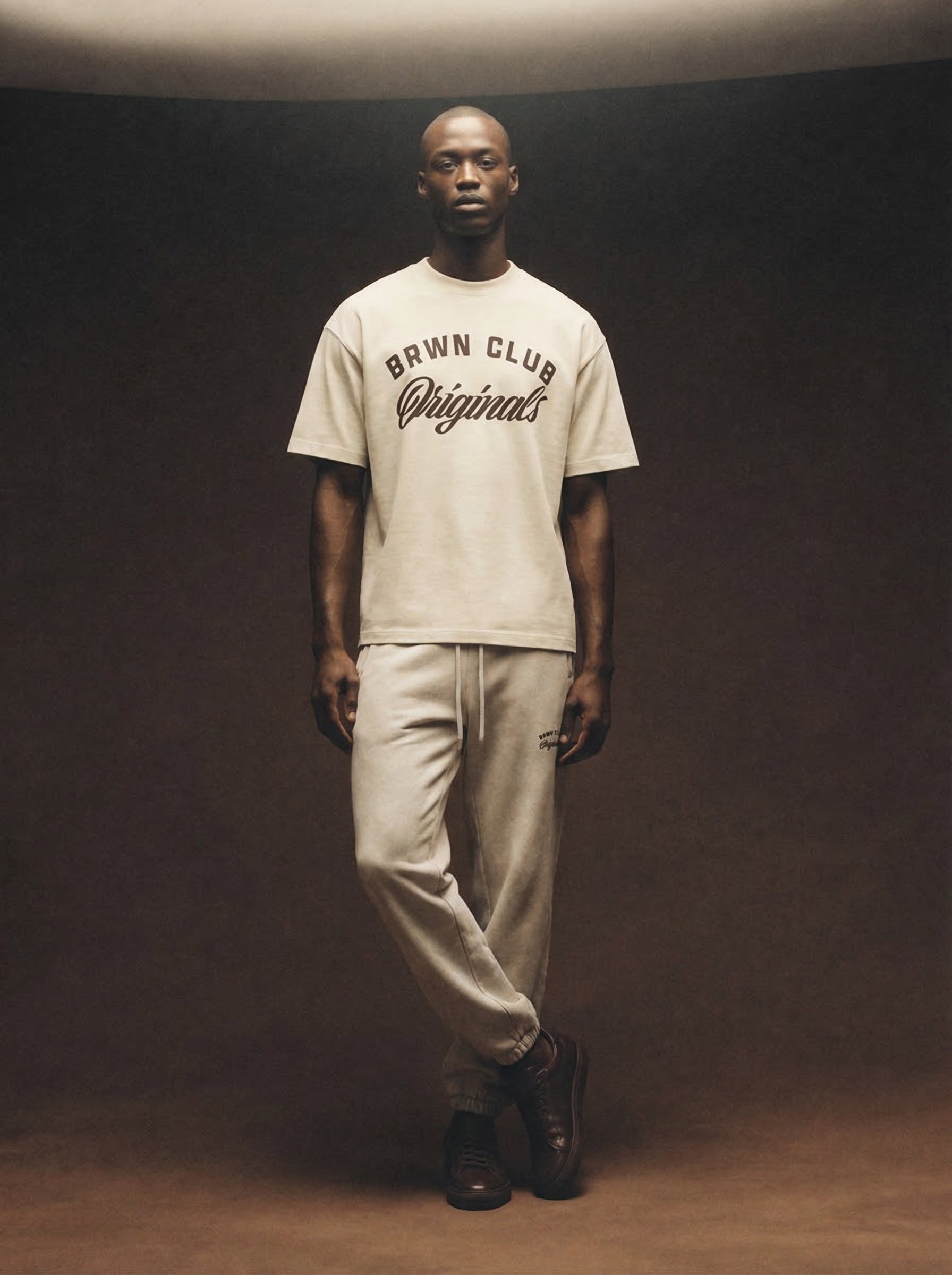Originals Fleeced Jogger Sweatpants — worn with tee, moody editorial