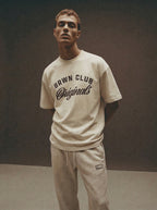 Originals Boxy Oversized T-Shirt — styled with joggers, moody editorial