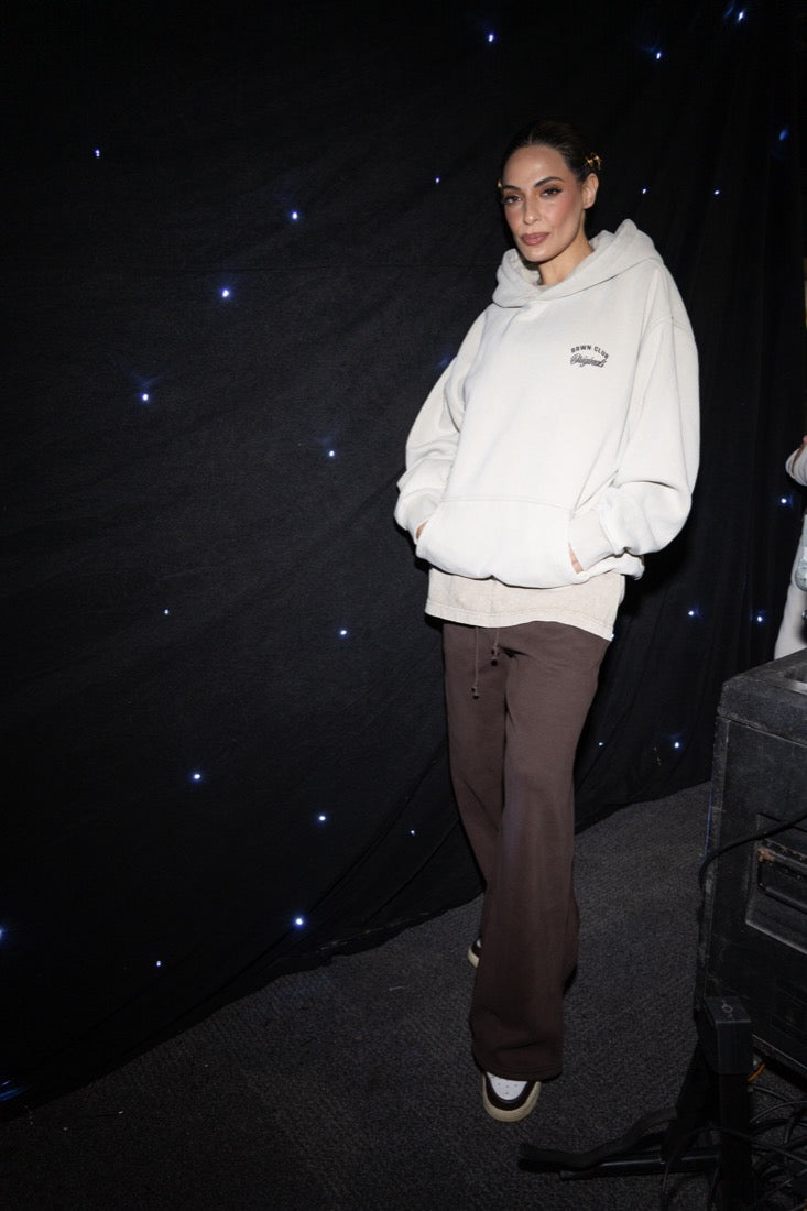 BRWN CLUB runway Look 02 The Original Layer neutral hoodie and plain brown trousers